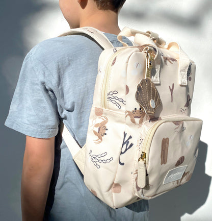 Smėlio spalvos keliautojų kuprinė