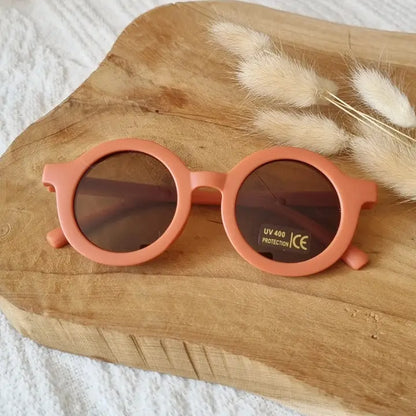 Vaikiški saulės akiniai su UV400 apsauga oranžinės spalvos